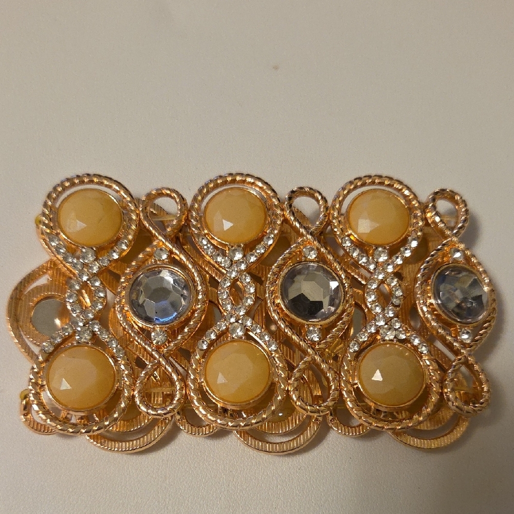Elegant Gold and Yellow Brooch